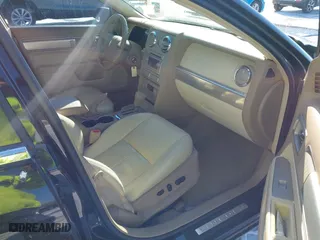 2007 Lincoln MKZ with VIN 3LNHM26T07R653177, listed as a IAAI auction lot 41571111 with 124,929 mi miles. Bid and sale history available at carsss.com. Image 5.