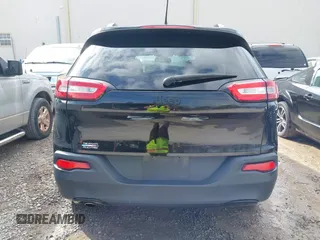 2017 Jeep Cherokee Altitude with VIN 1C4PJLAB7HW660624, listed as a IAAI auction lot 41488683 with 106,963 mi miles and . Bid and sale history available at DreamBid. Image 16.