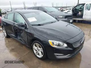 2015 Volvo S60 T5 Drive-E Premier Plus with VIN YV140MFC4F2305616, listed as a IAAI auction lot 41560472 with 123,714 mi miles. Bid and sale history available at carsss.com. Image 1.