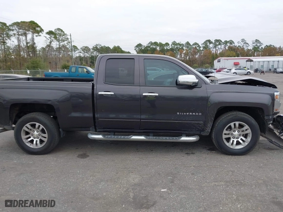 2016 Chevrolet Silverado 1500 LT with VIN 1GCRCREC7GZ109079, listed as a IAAI auction lot 40985730 with 162,630 mi miles. Bid and sale history available at carsss.com. Image 13.