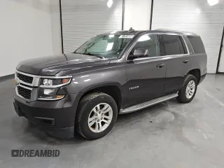 2015 Chevrolet Tahoe LS z VIN 1GNSKAEC2FR647457, wystawiony jako Copart lot #51751605 z przebiegiem 119 439 mil mil oraz Czysty tytuł • Clean title. Historia ofert i sprzedaży dostępna na DreamBid. Obrazek 1.