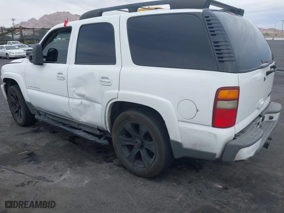 2003 Chevrolet Tahoe Z71 with VIN 1GNEK13Z03R240494, listed as a IAAI auction lot 42075566 with 203,398 mi miles. Bid and sale history available at carsss.com. Image 3.