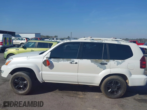 2004 Lexus GX 470 with VIN JTJBT20XX40063036, listed as a IAAI auction lot 41780865 with 222,285 mi miles. Bid and sale history available at carsss.com. Image 14.