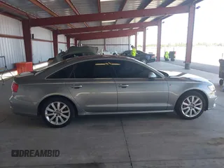 2012 Audi A6 Prestige с VIN WAUHGAFC6CN080091, выставлен на аукционе IAAI как лот 41964023 с пробегом 166 334 миль миль и . История ставок и продаж доступна на DreamBid. Изображение 13.