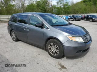 2011 Honda Odyssey EX-L with VIN 5FNRL5H6XBB002136, listed as a Copart auction lot 55162645 with 172,425 mi miles and Salvage Title. Bid and sale history available at DreamBid. Image 4.