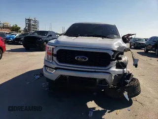 2021 Ford F-150 XL с VIN 1FTFW1E55MKE33598, выставлен на аукционе Copart как лот 56326985 с пробегом 88 830 миль миль и Списание • Salvage title. История ставок и продаж доступна на DreamBid. Изображение 14.