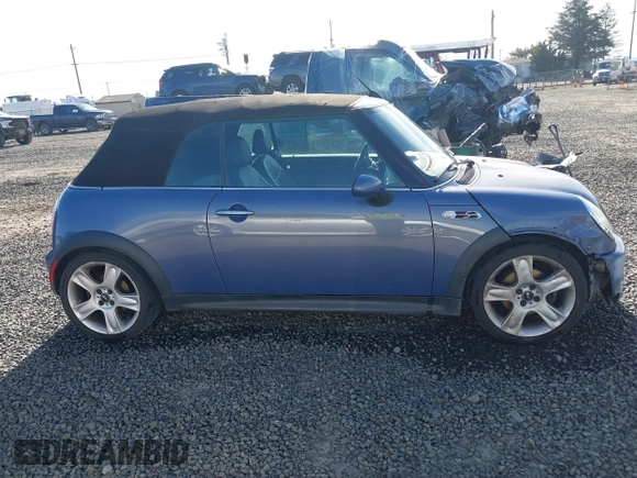 2005 MINI Convertible S with VIN WMWRH33455TF82408, listed as a IAAI auction lot 41857791 with 133,824 mi miles and . Bid and sale history available at DreamBid. Image 13.