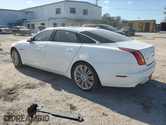2013 Jaguar XJ Supercharged with VIN SAJWA2GE3DMV45811, listed as a Copart auction lot 76585864 with 53,570 mi miles and Salvage title. Bid and sale history available at DreamBid. Image 2.
