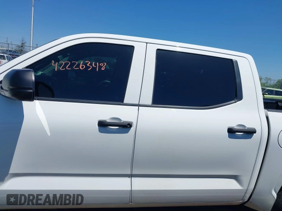 2023 Toyota Tundra SR with VIN 5TFKB5DB0PX065072, listed as a IAAI auction lot 42226348 with 53,539 mi miles and . Bid and sale history available at DreamBid. Image 14.
