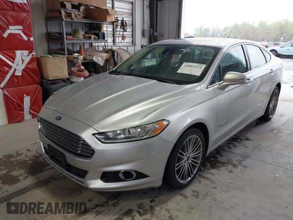 2013 Ford Fusion SE Hybrid with VIN 3FA6P0LU2DR319335, listed as a IAAI auction lot 42007573 with 135,099 mi miles. Bid and sale history available at carsss.com. Image 17.