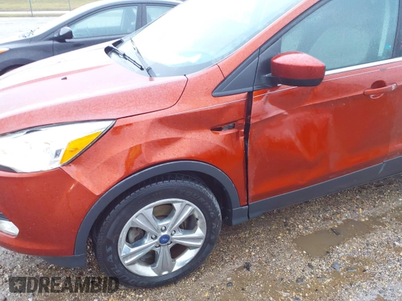2016 Ford Escape SE with VIN 1FMCU0GXXGUA64940, listed as a IAAI auction lot 41223394 with 150,929 mi miles and . Bid and sale history available at carsss.com. Image 6.