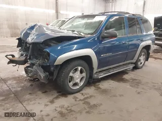 2005 Chevrolet TrailBlazer LT with VIN 1GNDT13S052136871, listed as a IAAI auction lot 41644035 with 174,070 mi miles. Bid and sale history available at carsss.com. Image 2.