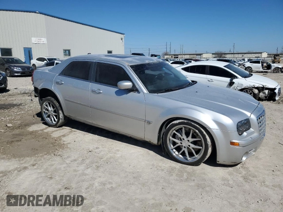 2006 Chrysler 300 C SRT8 with VIN 2C3KA73W76H101950, listed as a Copart auction lot 48501125 with 144,696 mi miles and Salvage Title. Bid and sale history available at carsss.com. Image 4.