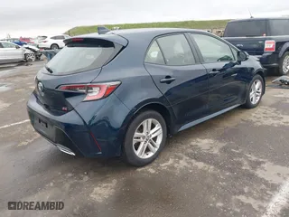 2021 Toyota Corolla Hatchback SE with VIN JTND4MBE8M3107240, listed as a IAAI auction lot 41570554 with 35,583 mi miles. Bid and sale history available at carsss.com. Image 4.
