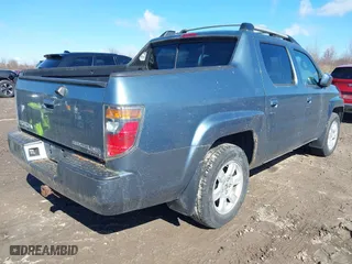 2007 Honda Ridgeline RTL w/Leather with VIN 2HJYK16547H527191, listed as a IAAI auction lot 42056127 with 126,715 mi miles. Bid and sale history available at carsss.com. Image 4.