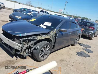 2016 Nissan Altima SR with VIN 1N4AL3AP1GC285363, listed as a IAAI auction lot 41754598 with 121,923 mi miles and . Bid and sale history available at carsss.com. Image 17.