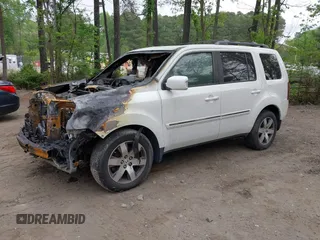 2014 Honda Pilot Touring z VIN 5FNYF4H93EB022045, wystawiony jako IAAI lot #42060815 z przebiegiem Nie podano mil oraz . Historia ofert i sprzedaży dostępna na DreamBid. Obrazek 2.