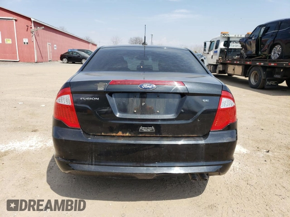 2012 Ford Fusion SE z VIN 3FAHP0HA1CR240275, wystawiony jako Copart lot #54240545 z przebiegiem 279 950 mil mil oraz Szkoda całkowita • Salvage title. Historia ofert i sprzedaży dostępna na DreamBid. Obrazek 6.