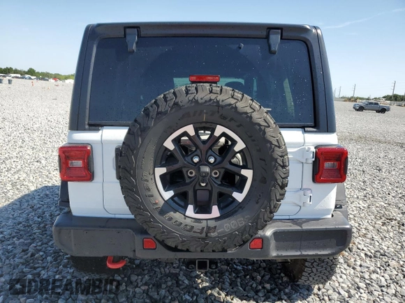 2025 Jeep Wrangler Rubicon with VIN 1C4PJXFN2SW525858, listed as a Copart auction lot 57415905 with 7,802 mi miles and Salvage title. Bid and sale history available at DreamBid. Image 6.