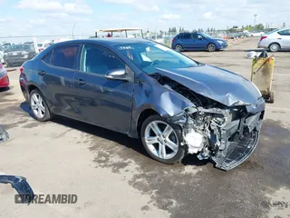 2014 Toyota Corolla L with VIN 5YFBURHE5EP005970, listed as a IAAI auction lot 42131661 with 115,840 mi miles and . Bid and sale history available at DreamBid. Image 1.
