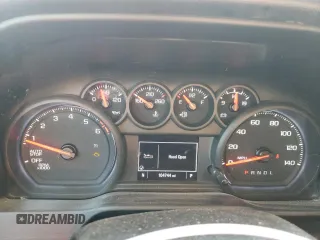 2021 Chevrolet Silverado 1500 Custom with VIN 1GCRWBEK0MZ188967, listed as a Copart auction lot 87637995 with 104,744 mi miles and Salvage Title. Bid and sale history available at DreamBid. Image 9.