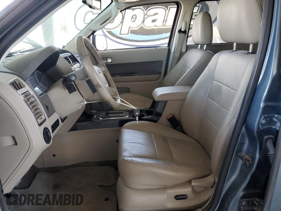 2010 Ford Escape Hybrid with VIN 1FMCU4K32AKB06645, listed as a Copart auction lot 63124055 with 162,646 mi miles and Salvage title. Bid and sale history available at DreamBid. Image 7.