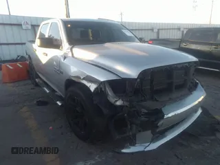 2016 Ram 1500 Express z VIN 1C6RR6KT5GS107381, wystawiony jako IAAI lot #41289844 z przebiegiem 154 989 mil mil oraz . Historia ofert i sprzedaży dostępna na DreamBid. Obrazek 1.