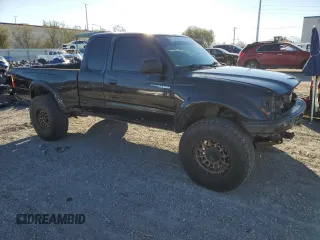 2002 Toyota Tacoma z VIN 5TEWN72N72Z094426, wystawiony jako Copart lot #45386145 z przebiegiem 159 355 mil mil oraz Szkoda całkowita • Salvage title. Historia ofert i sprzedaży dostępna na DreamBid. Obrazek 4.