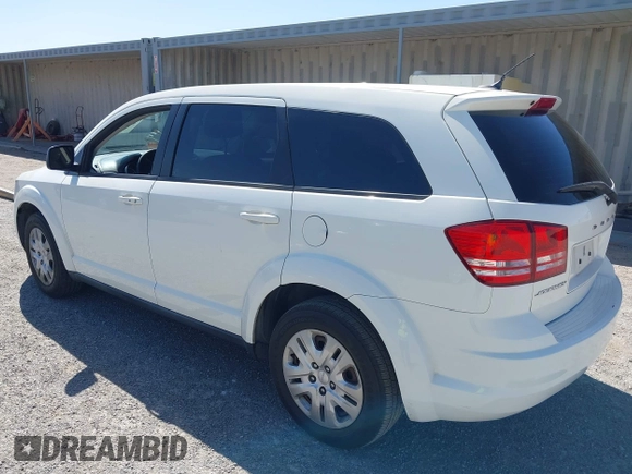 2014 Dodge Journey SE with VIN 3C4PDCAB4ET193896, listed as a IAAI auction lot 42126565 with 242,108 mi miles and . Bid and sale history available at carsss.com. Image 3.
