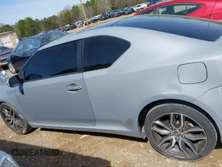 2014 Scion tC with VIN JTKJF5C78E3075164, listed as a IAAI auction lot 41922609 with 142,064 mi miles. Bid and sale history available at carsss.com. Image 15.