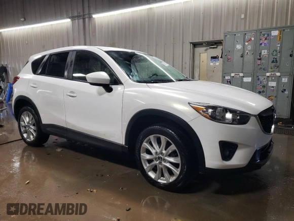 2014 Mazda CX-5 Grand Touring with VIN JM3KE4DY7E0417308, listed as a Copart auction lot 88161195 with 107,493 mi miles and Salvage Title. Bid and sale history available at carsss.com. Image 4.