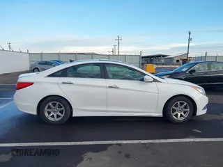 2014 Hyundai Sonata SE with VIN 5NPEC4AC5EH880717, listed as a IAAI auction lot 41275243 with 145,577 mi miles and . Bid and sale history available at DreamBid. Image 13.