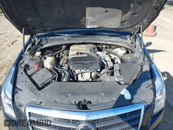2013 Cadillac ATS z VIN 1G6AG5RX8D0160407, wystawiony jako IAAI lot #41872957 z przebiegiem 159 840 mil mil oraz . Historia ofert i sprzedaży dostępna na DreamBid. Obrazek 10.