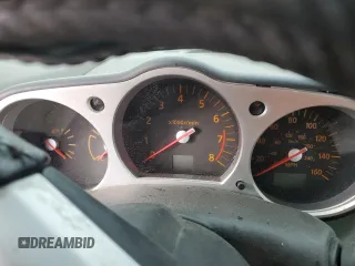 2004 Nissan 350Z Enthusiast z VIN JN1AZ36A74T013105, wystawiony jako Copart lot #82797874 z przebiegiem Nie podano mil oraz Szkoda całkowita • Salvage title. Historia ofert i sprzedaży dostępna na DreamBid. Obrazek 9.