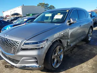 2024 Genesis GV80 z VIN KMUHCESC4RU178074, wystawiony jako IAAI lot #41800883 z przebiegiem 10 725 mil mil oraz . Historia ofert i sprzedaży dostępna na DreamBid. Obrazek 6.