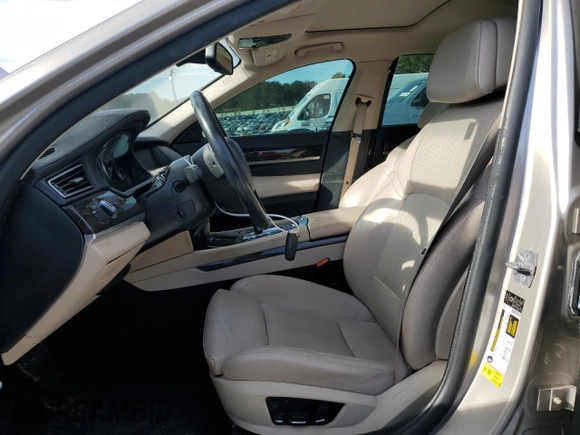 2012 BMW 7 Series 750Li с VIN WBAKB8C54CC965064, выставлен на аукционе Copart как лот 46308795 с пробегом 103 301 миль миль и Списание • Salvage title. История ставок и продаж доступна на DreamBid. Изображение 7.