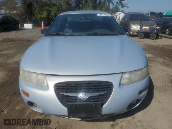 1997 Chrysler Sebring LXi z VIN 4C3AU52NXVE180034, wystawiony jako Copart lot #73413994 z przebiegiem 123 637 mil mil oraz Tytuł czysty. Historia ofert i sprzedaży dostępna na DreamBid. Obrazek 5.