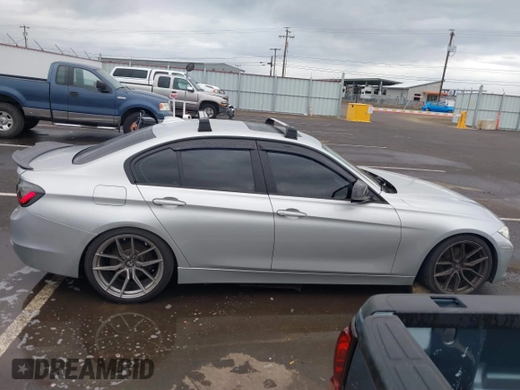 2014 BMW 3 Series 328i with VIN WBA3C1C58EK105766, listed as a IAAI auction lot 41692037 with 156,038 mi miles. Bid and sale history available at carsss.com. Image 13.