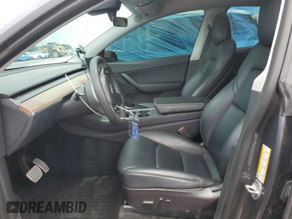 2022 Tesla Model Y Performance with VIN 7SAYGDEF4NF447462, listed as a Copart auction lot 58306595 with 61,671 mi miles and Non repairable. Bid and sale history available at DreamBid. Image 7.