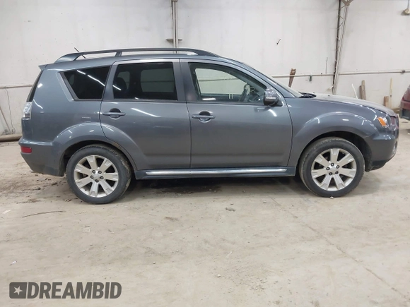 2011 Mitsubishi Outlander SE z VIN JA4JT3AWXBU007978, wystawiony jako IAAI lot #42337365 z przebiegiem 239 587 mil mil oraz . Historia ofert i sprzedaży dostępna na DreamBid. Obrazek 13.