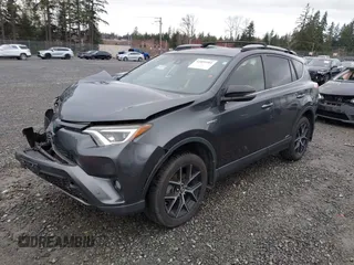 2018 Toyota RAV4 Hybrid SE with VIN JTMJJREV7JD208249, listed as a IAAI auction lot 41859301 with 91,899 mi miles and . Bid and sale history available at DreamBid. Image 17.