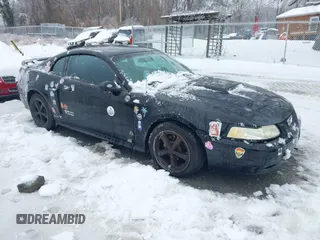 2004 Ford Mustang GT Deluxe z VIN 1FAFP42X64F174252, wystawiony jako IAAI lot #41549048 z przebiegiem 229 856 mil mil oraz . Historia ofert i sprzedaży dostępna na DreamBid. Obrazek 1.