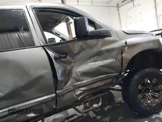 2006 Dodge 2500 SLT with VIN 1D7KS28C06J214959, listed as a IAAI auction lot 41125689 with 245,429 mi miles and . Bid and sale history available at DreamBid. Image 18.