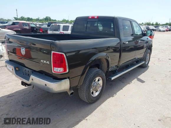 2013 Ram 2500 Laramie with VIN 3C6UR5FL7DG529590, listed as a IAAI auction lot 42266965 with 141,603 mi miles and . Bid and sale history available at DreamBid. Image 4.