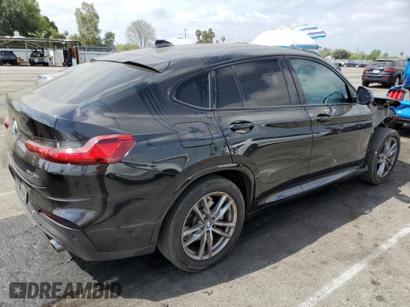 2020 BMW X4 xDrive30i z VIN 5UX2V1C0XL9B93562, wystawiony jako Copart lot #56180595 z przebiegiem 71 667 mil mil oraz Szkoda całkowita • Salvage title. Historia ofert i sprzedaży dostępna na DreamBid. Obrazek 3.