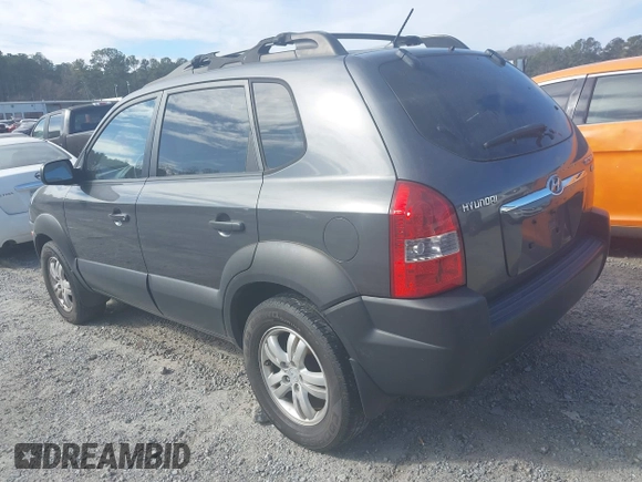 2007 Hyundai Tucson SE with VIN KM8JN12DX7U635740, listed as a IAAI auction lot 41648027 with 169,967 mi miles. Bid and sale history available at carsss.com. Image 3.