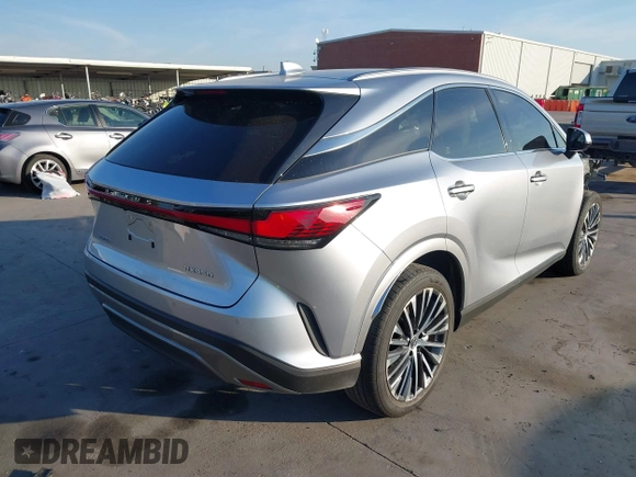 2023 Lexus RX with VIN JTJCHMAA6P2000651, listed as a IAAI auction lot 40700931 with 6,576 mi miles. Bid and sale history available at carsss.com. Image 4.