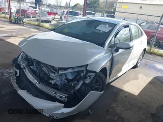 2021 Toyota Corolla Hybrid LE with VIN JTDEAMDE7MJ012694, listed as a IAAI auction lot 41794233 with 103,363 mi miles. Bid and sale history available at carsss.com. Image 18.