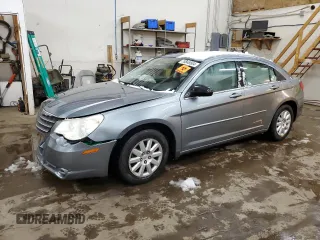 2010 Chrysler Sebring Touring with VIN 1C3CC4FBXAN194971, listed as a Copart auction lot 78848504 with 218,885 mi miles and Salvage Title. Bid and sale history available at carsss.com. Image 1.
