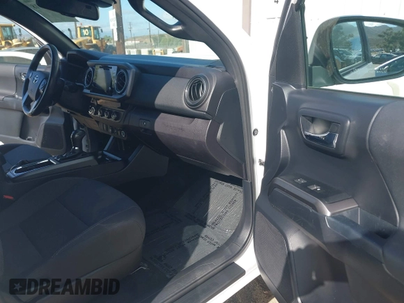 2018 Toyota Tacoma SR5 with VIN 3TMDZ5BN2JM037580, listed as a IAAI auction lot 42248418 with 35,661 mi miles and . Bid and sale history available at DreamBid. Image 5.